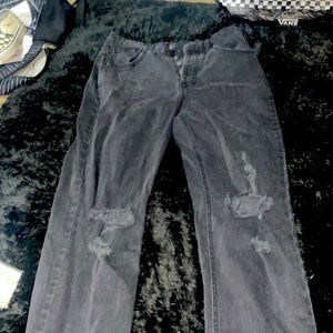 Black, baggy ripped jeans